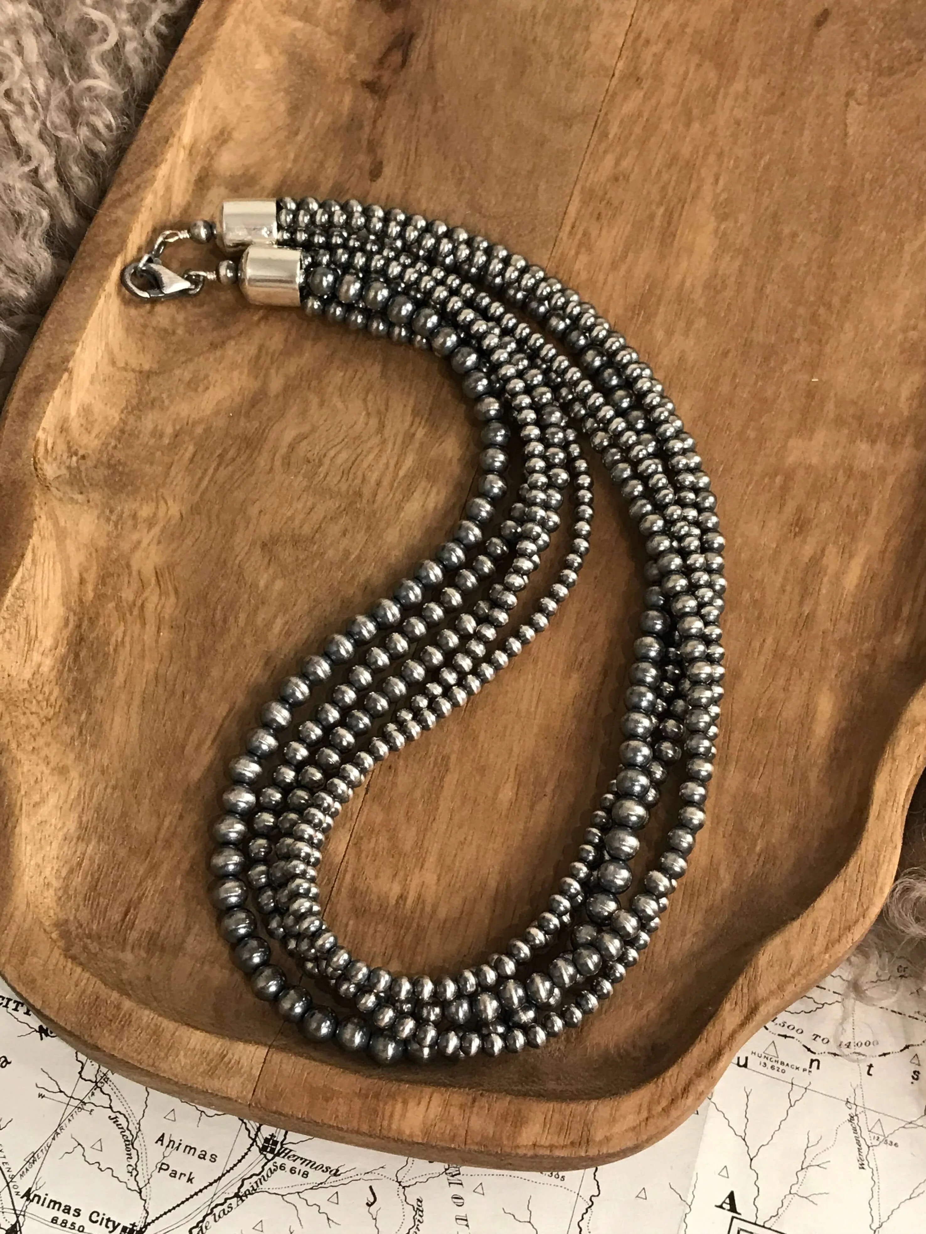 The Five Strand Pearl Necklace