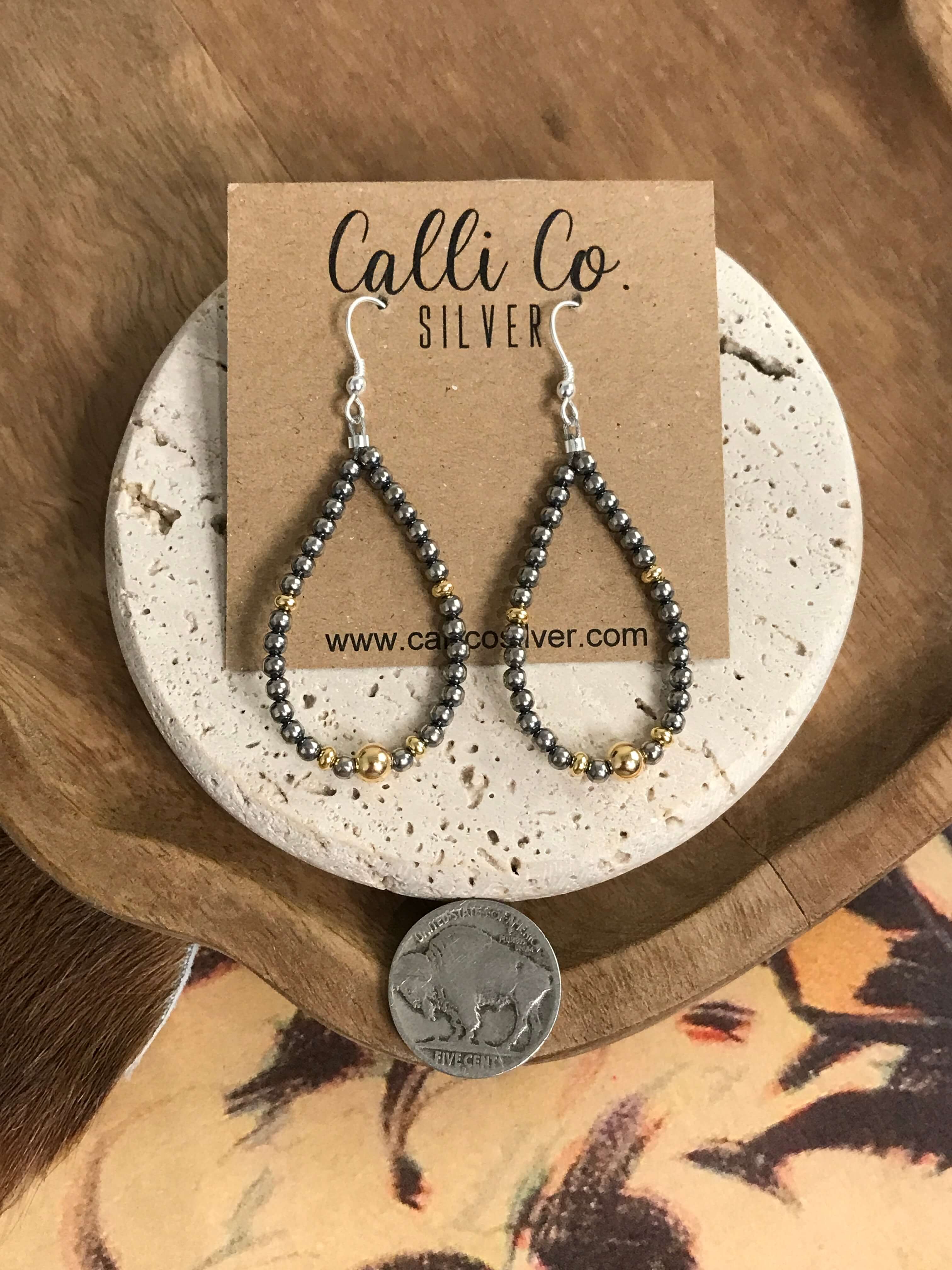 The Gold and Pearl Teardrop Hoop Earrings - Image 4