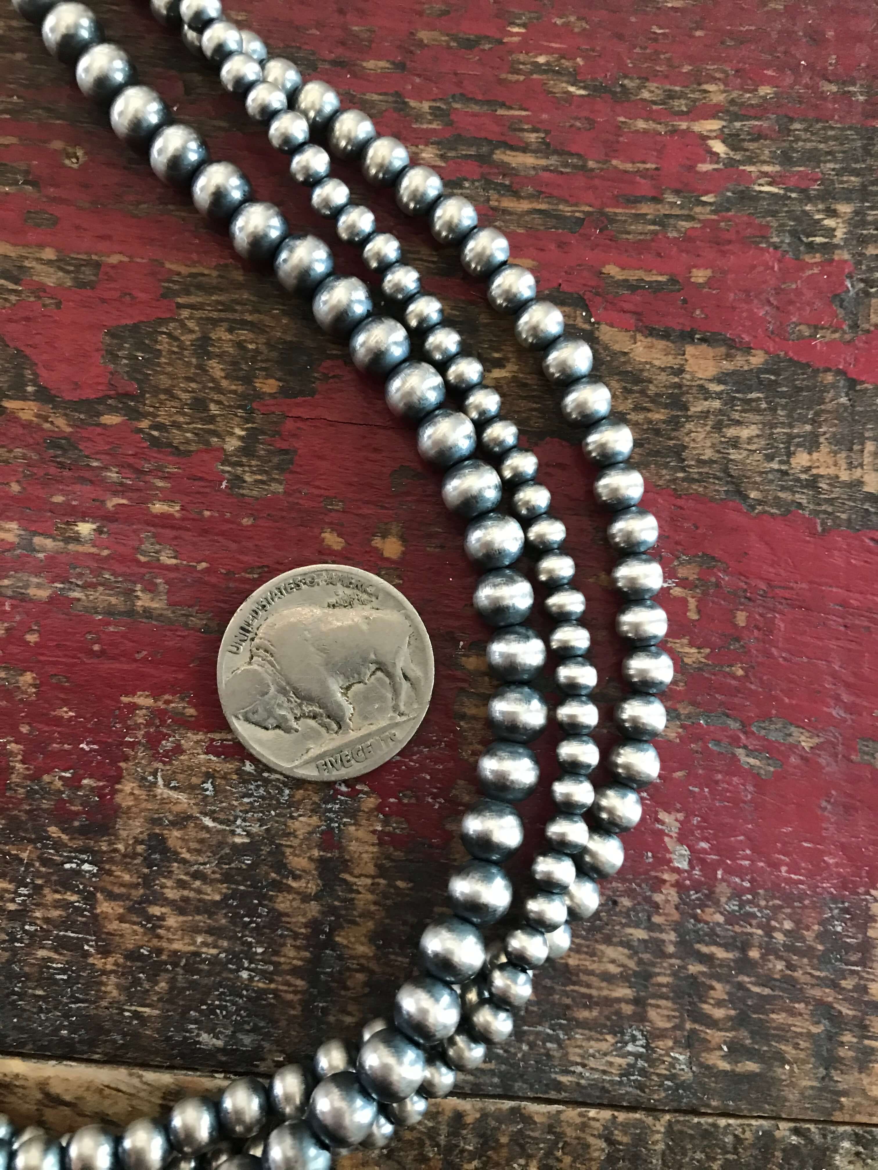 The Triple Strand Pearl Necklaces - Image 6